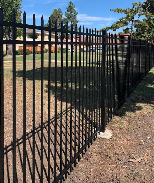 Black ornamental steel multifamily fence installed at a residential community in Stockton, CA.