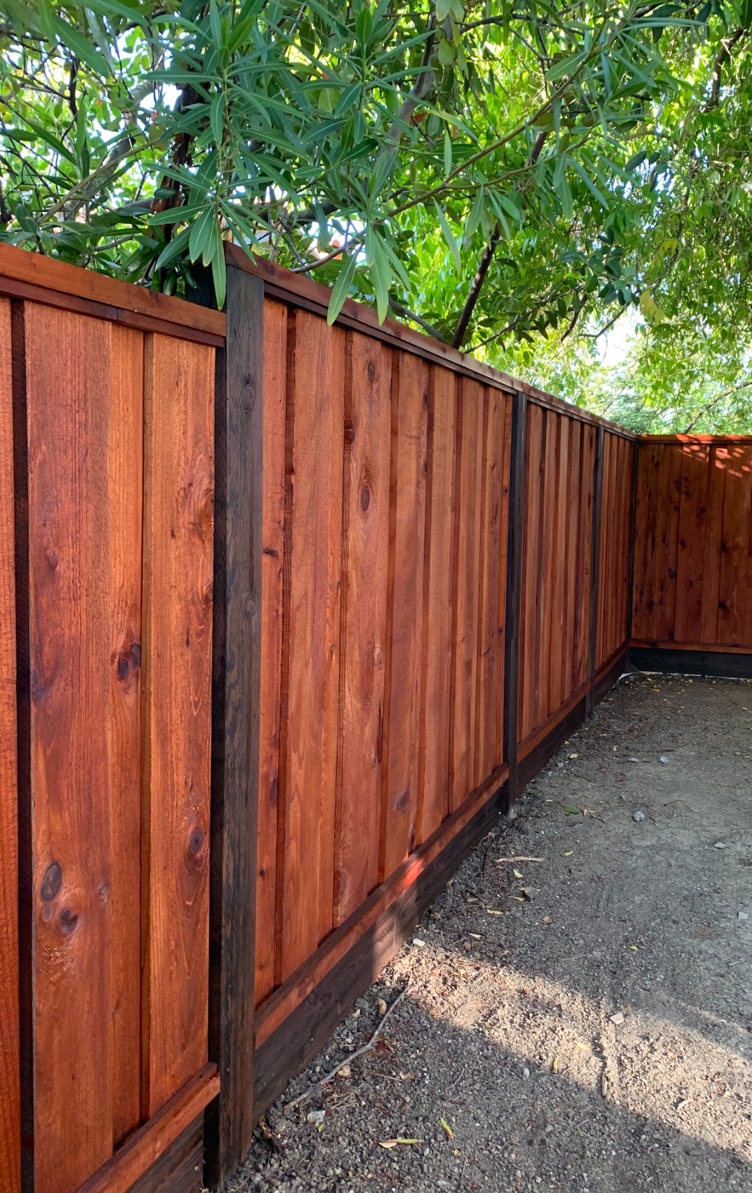 Redwood fence installation in Livermore CA by Cut Once Construction