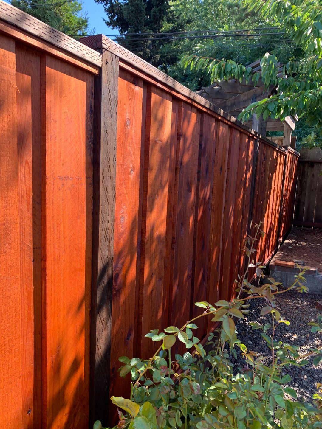 Board-on-board redwood fence by Cut Once Construction in Tri-Valley