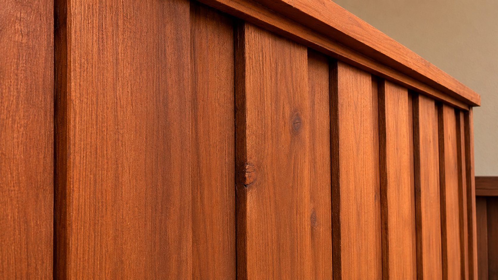Redwood fence panels installed by Cut Once Construction
